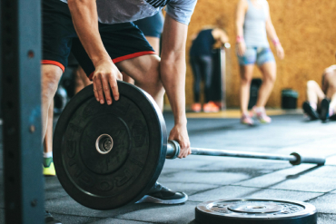 Person exercising with dumbbells